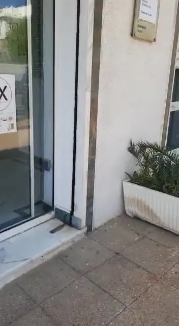 A LOXBOX pickup point, with its poster in the window